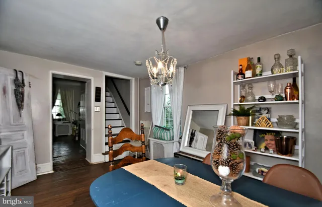 a room with furniture and a wooden floor