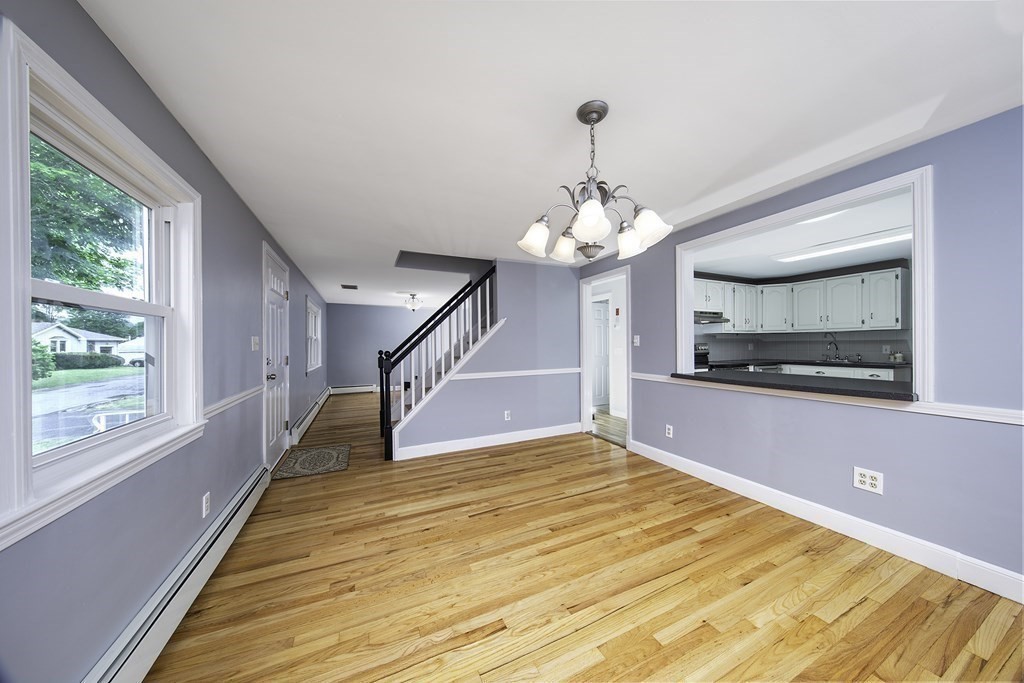 40 Brookside Avenue Danvers, MA 01923 - Photo 12 of 27 a view of an empty room with wooden floor and a window