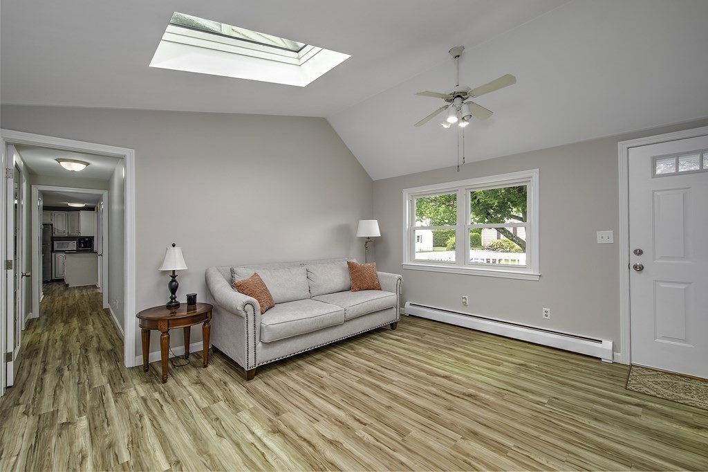 40 Brookside Avenue Danvers, MA 01923 - Photo 15 of 27 a living room with furniture and a window