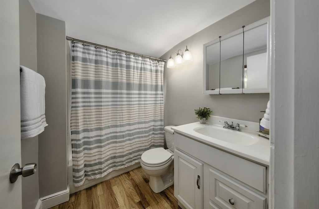 40 Brookside Avenue Danvers, MA 01923 - Photo 23 of 27 a bathroom with a sink toilet and shower