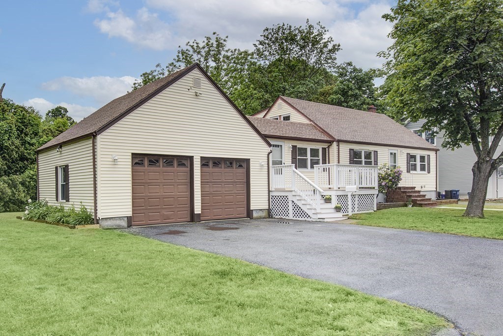 40 Brookside Avenue Danvers, MA 01923 - Photo 3 of 27 a view of a house with a yard and pathway