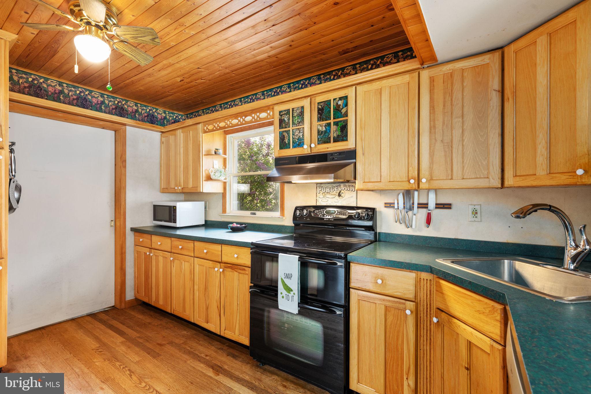 33611 Austin Grove Road Bluemont, VA 20135 - Photo 23 of 38 Custom stained glass in main kitchen