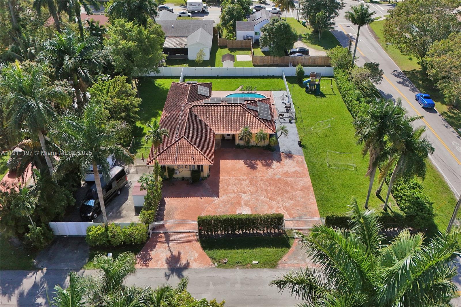 2 Northeast 160th Street Miami, FL 33162 - Photo 3 of 54 an aerial view of a house with garden space pool and seating area