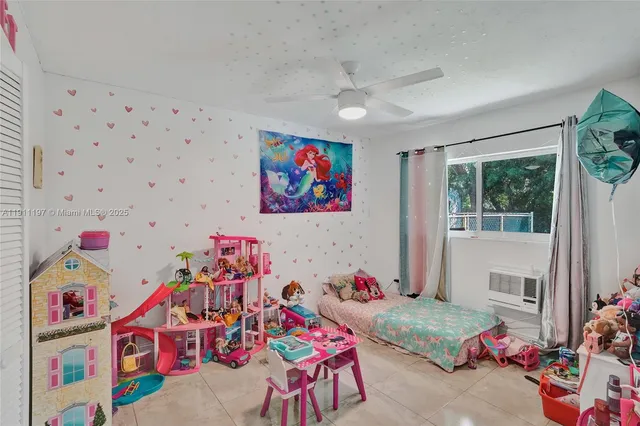 a view of a swimming pool with a yard and plants