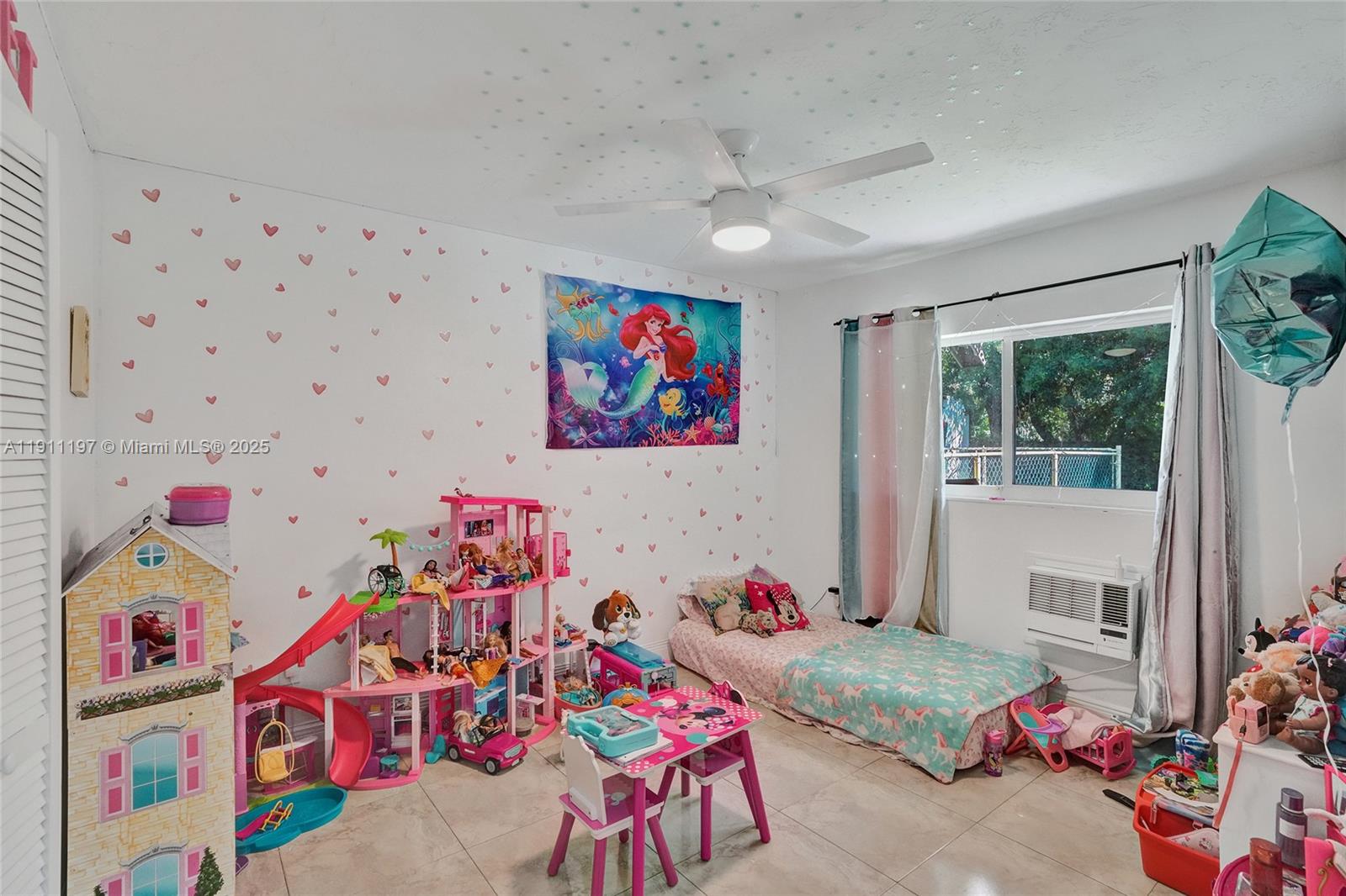 2 Northeast 160th Street Miami, FL 33162 - Photo 34 of 54 a bedroom with toys and a wooden floor