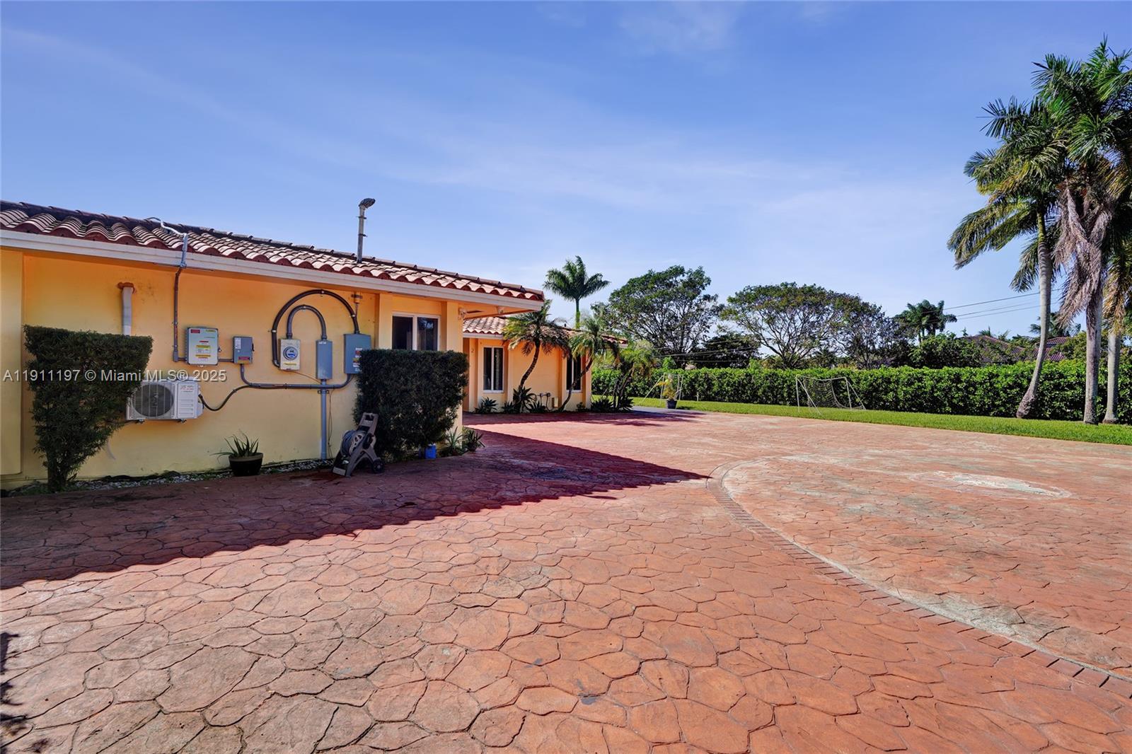 2 Northeast 160th Street Miami, FL 33162 - Photo 48 of 54 a view of a street with a building in the background