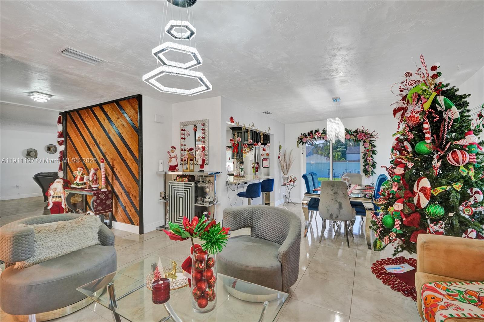 2 Northeast 160th Street Miami, FL 33162 - Photo 8 of 54 a living room with furniture and a potted plant