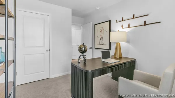 a room with a table and chairs