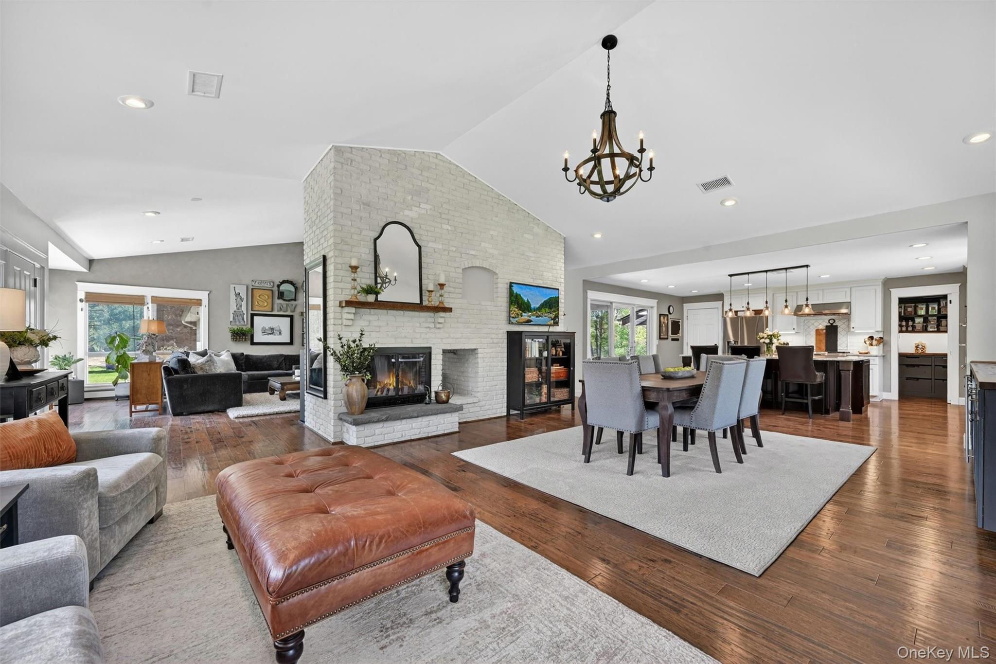 14 Ball Road Warwick, NY 10990 - Photo 2 of 37 a living room with furniture a fireplace and wooden floor