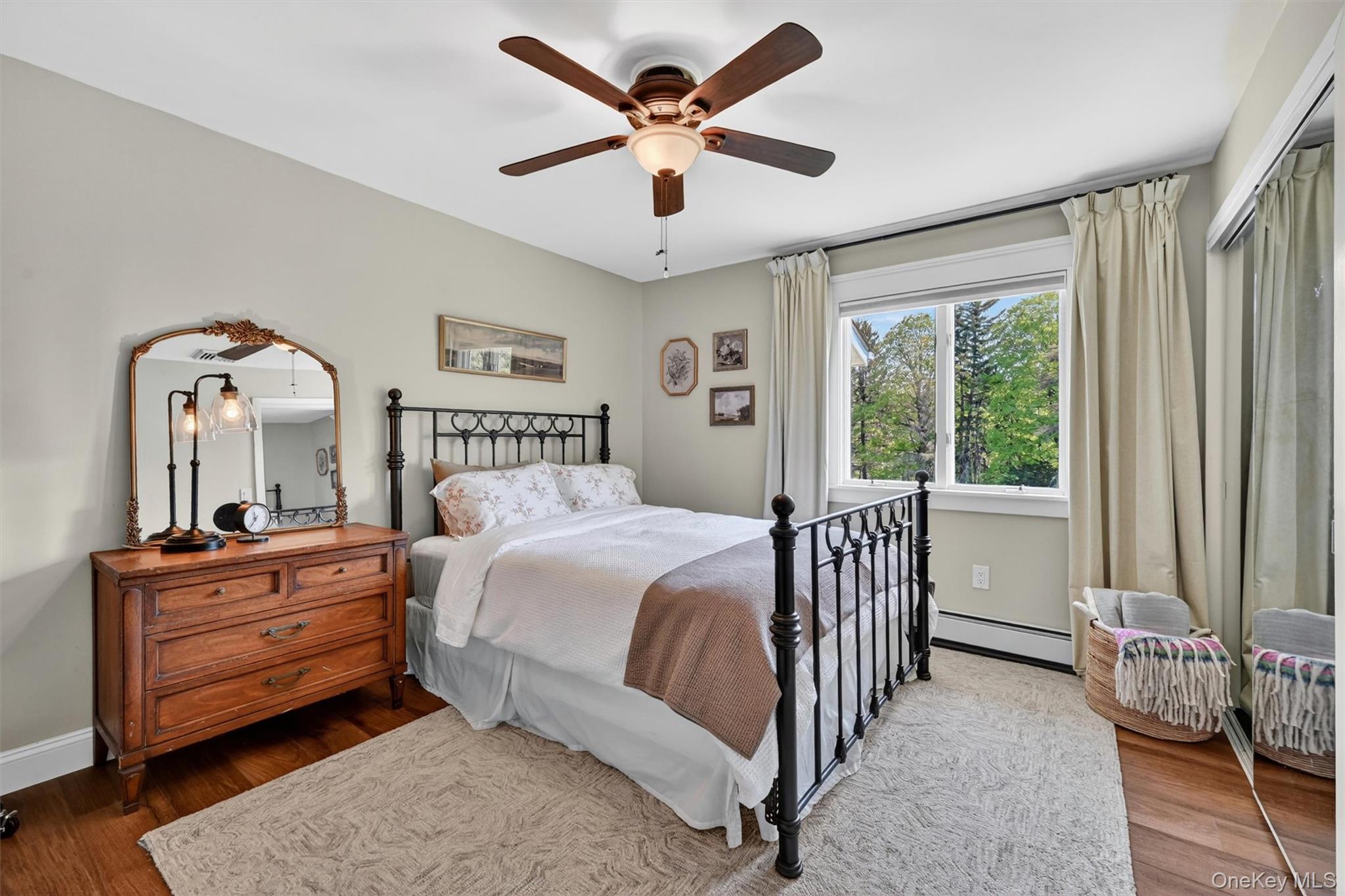 14 Ball Road Warwick, NY 10990 - Photo 21 of 37 a bedroom with a bed and a chandelier