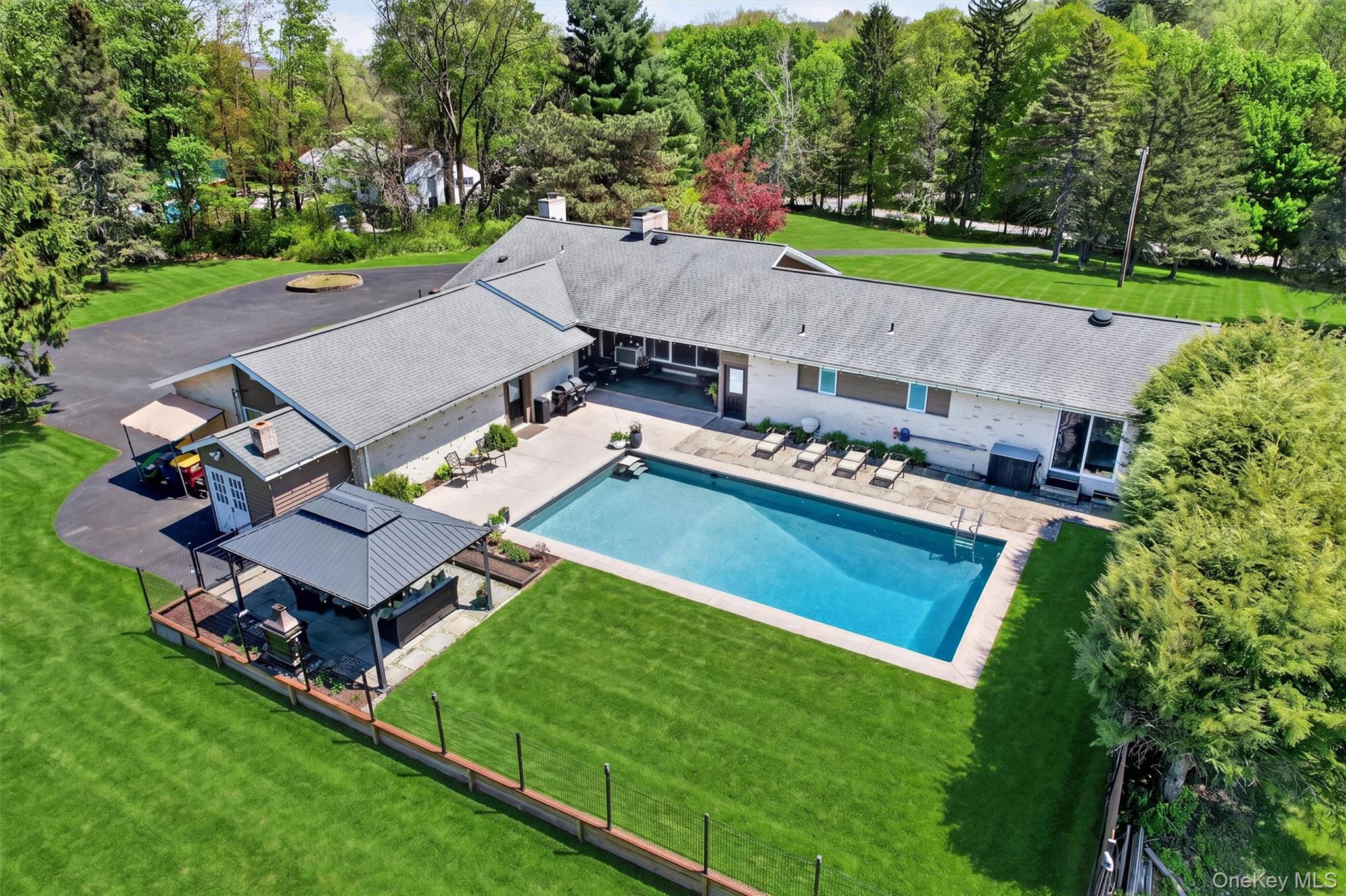 14 Ball Road Warwick, NY 10990 - Photo 31 of 37 an aerial view of a house with a garden and swimming pool