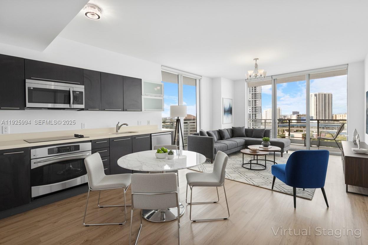 a kitchen with a dining table and chairs