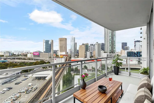 a view of balcony with furniture