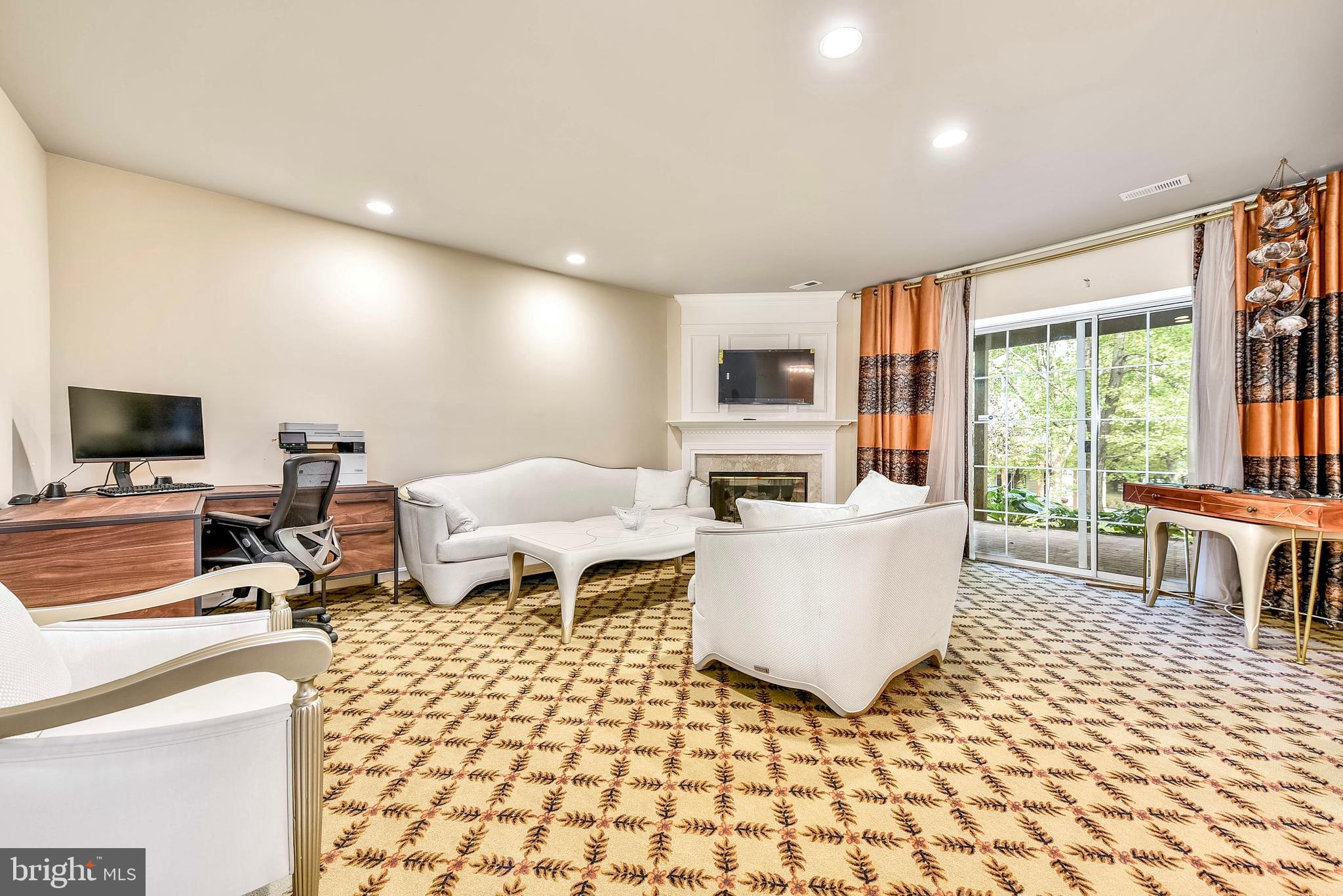 20870 Trinity Square Sterling, VA 20165 - Photo 28 of 36 LOWER LEVEL - GAS FIREPLACE