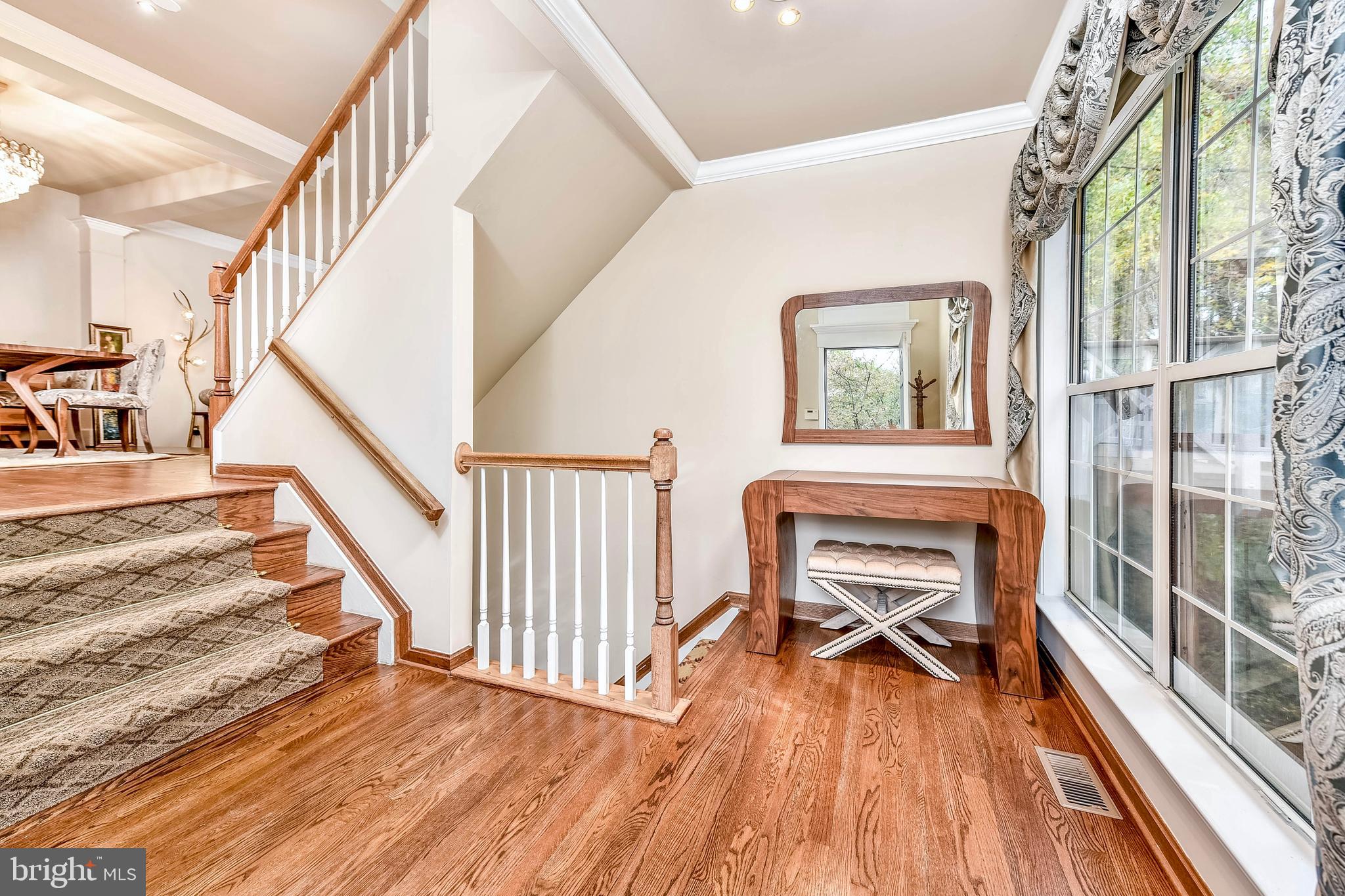 20870 Trinity Square Sterling, VA 20165 - Photo 3 of 36 FOYER WITH FULL WALL OF WINDOWS