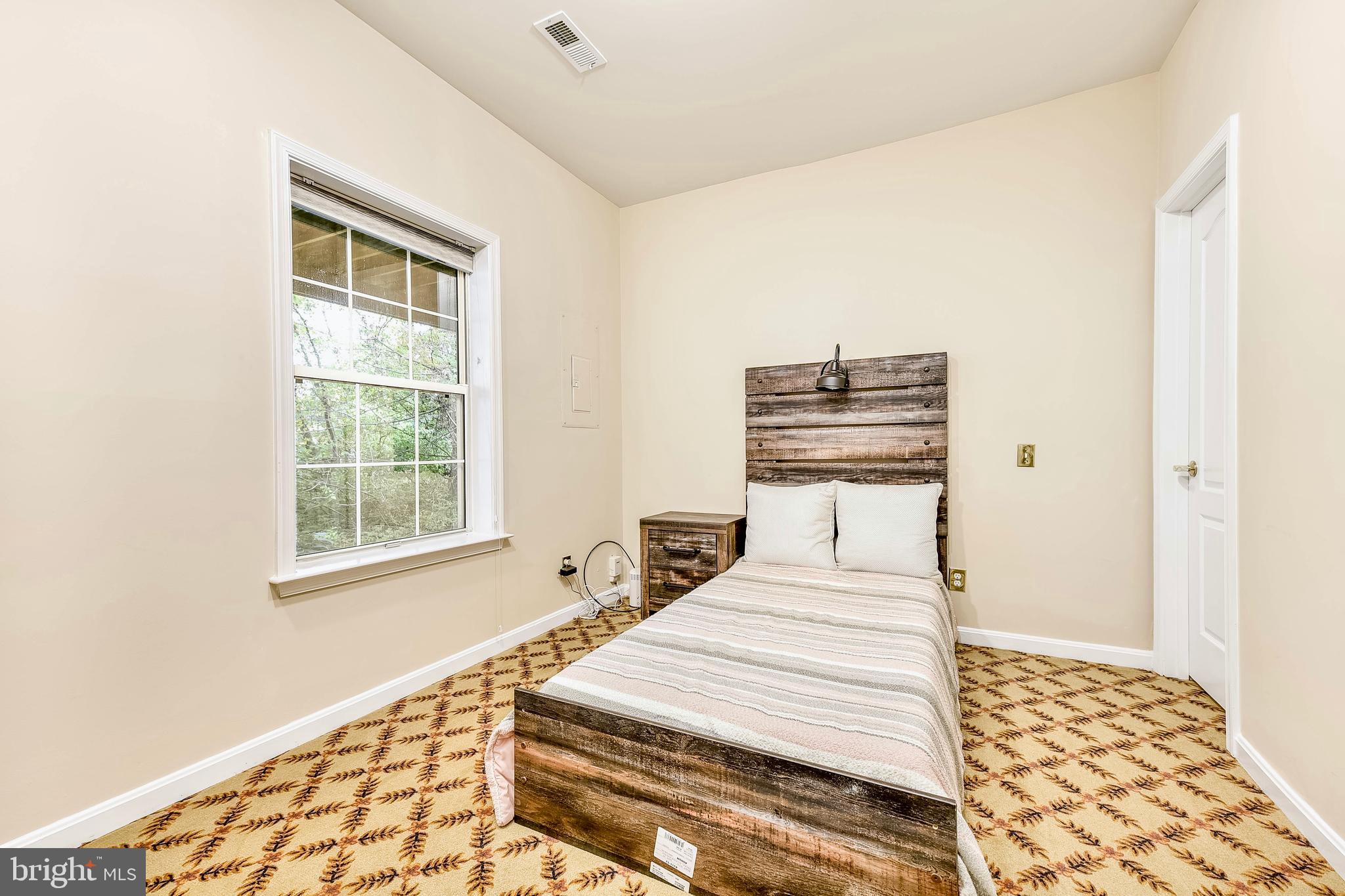 20870 Trinity Square Sterling, VA 20165 - Photo 31 of 36 BEDROOM WITH WALK IN CLOSET AND ENSUITE BATHROOM