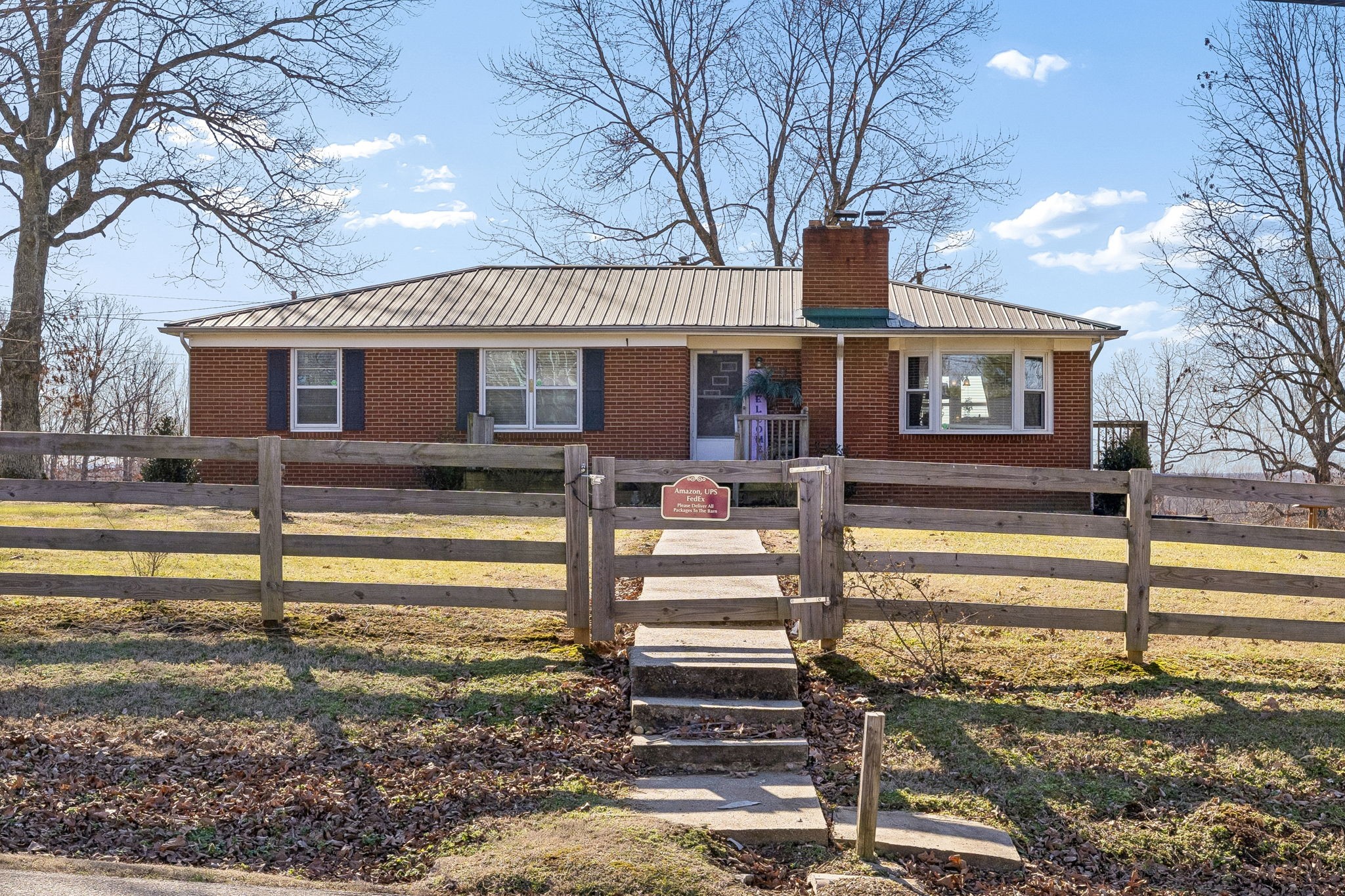 155 West Piney Road Dickson, TN 37055 - Photo 1 of 45 a front view of a house with swimming pool