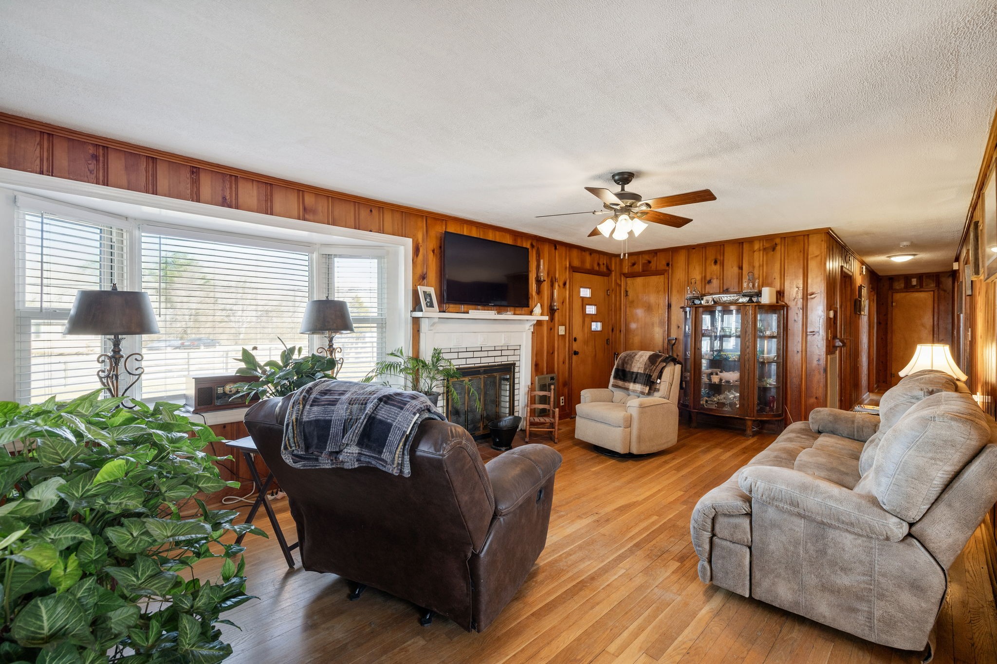 155 West Piney Road Dickson, TN 37055 - Photo 12 of 45 a living room with fireplace furniture and a floor to ceiling window
