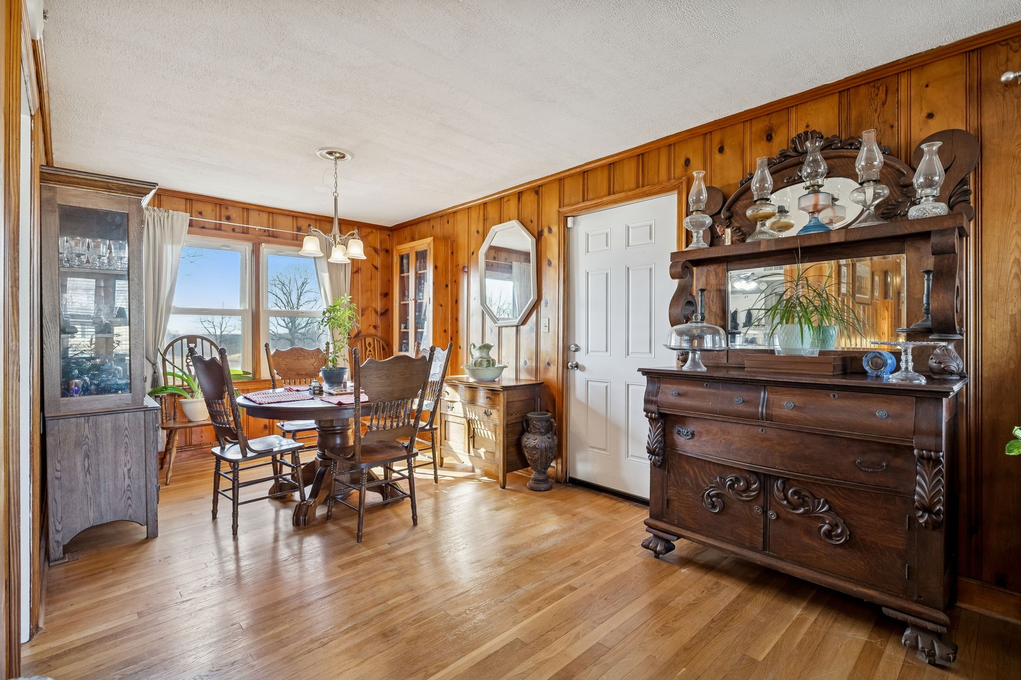 155 West Piney Road Dickson, TN 37055 - Photo 14 of 45 a view of a dining room with furniture window and wooden floor