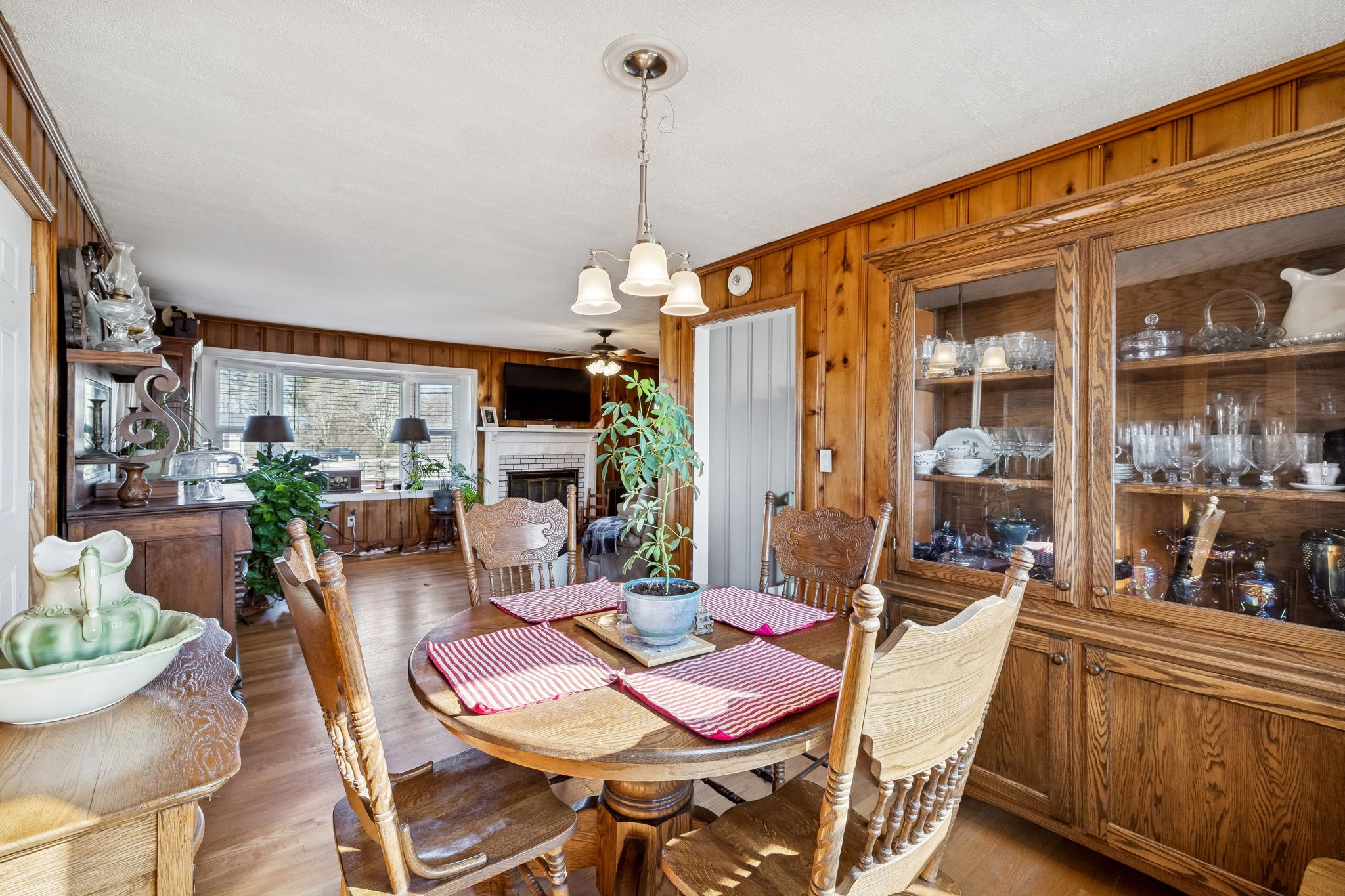 155 West Piney Road Dickson, TN 37055 - Photo 16 of 45 a dining room with furniture a chandelier and wooden floor