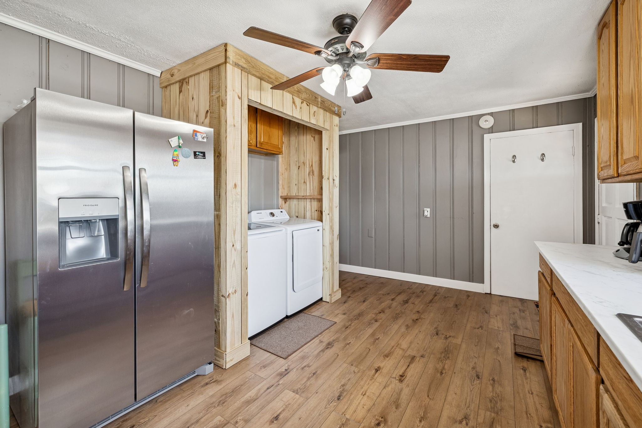 155 West Piney Road Dickson, TN 37055 - Photo 19 of 45 a view of a kitchen with a refrigerator a sink dishwasher a refrigerator and wooden floor