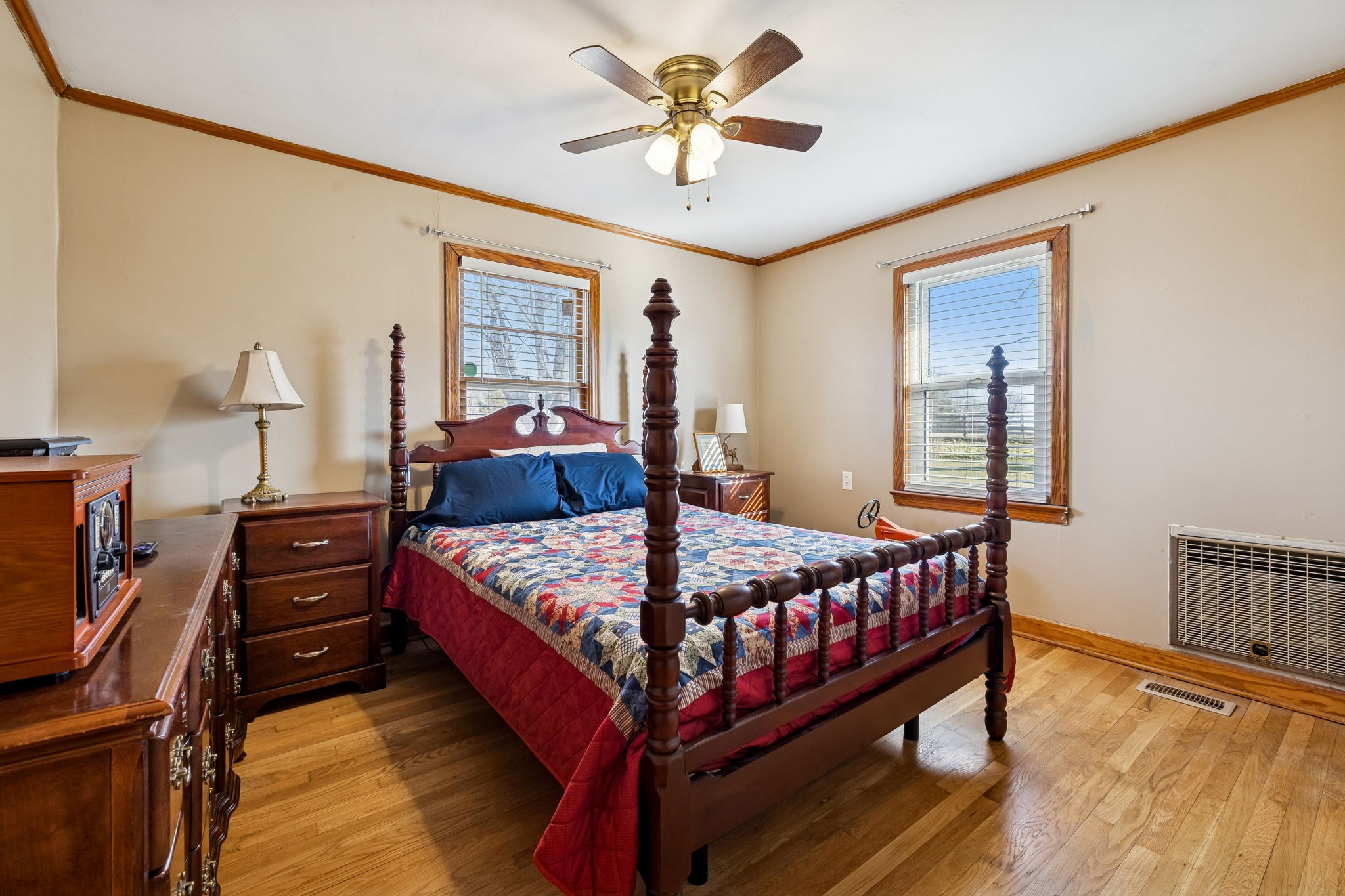 155 West Piney Road Dickson, TN 37055 - Photo 21 of 45 a bed sitting in a bedroom next to a window