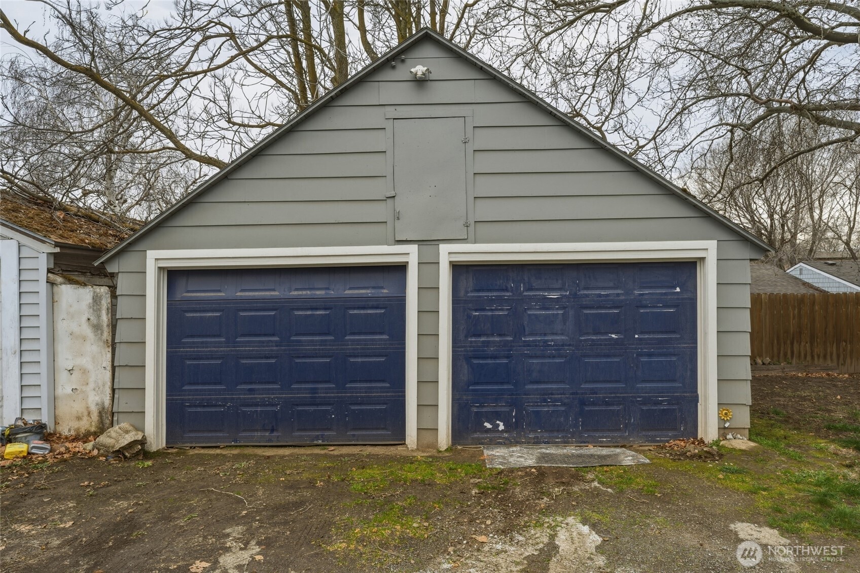 15 Southwest 13th Street College Place, WA 99324 - Photo 21 of 36 a view of a wooden house with a large door