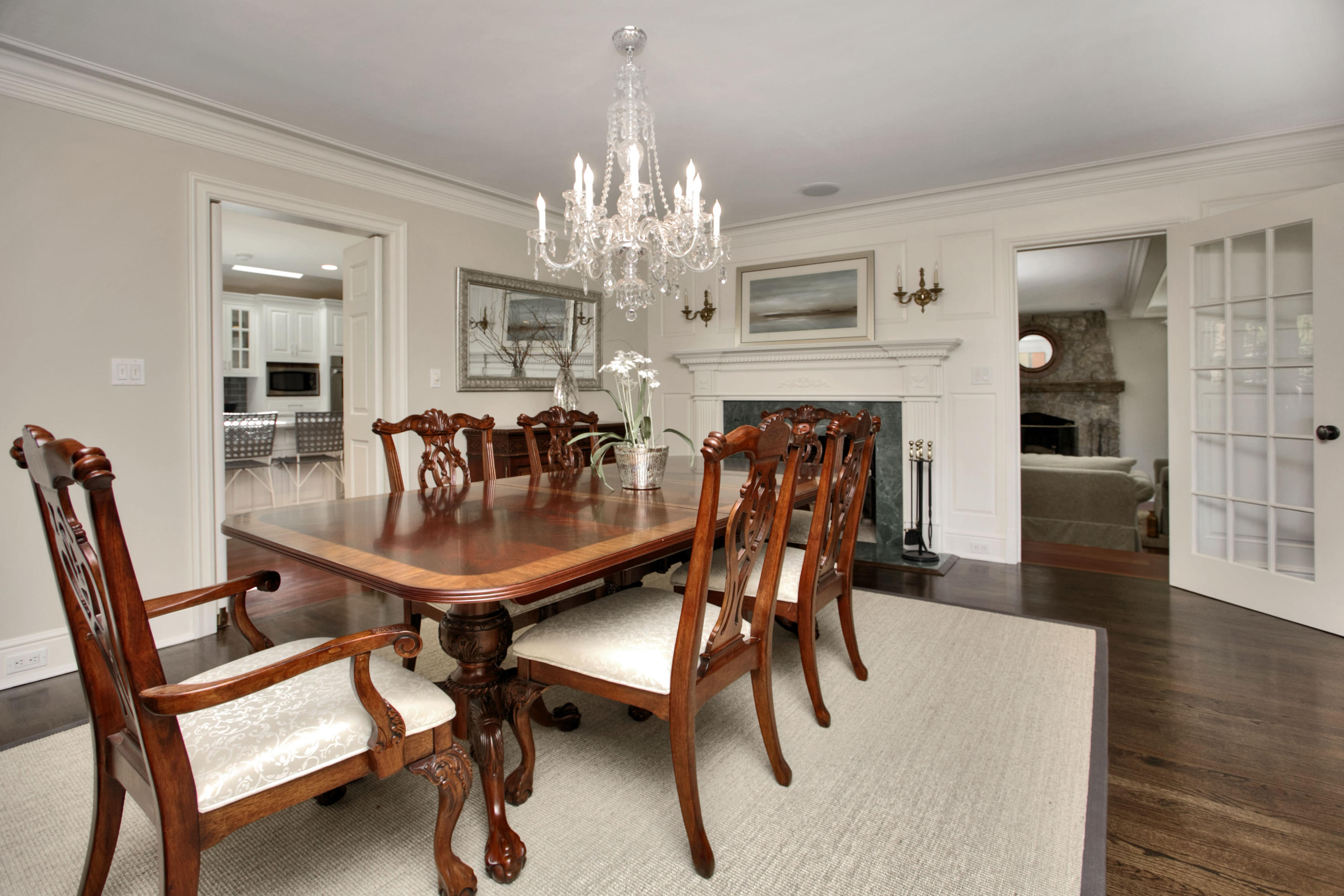 4 St Nicholas Road Darien, CT 06820 - Photo 8 of 15 a view of a dining room with furniture and chandelier