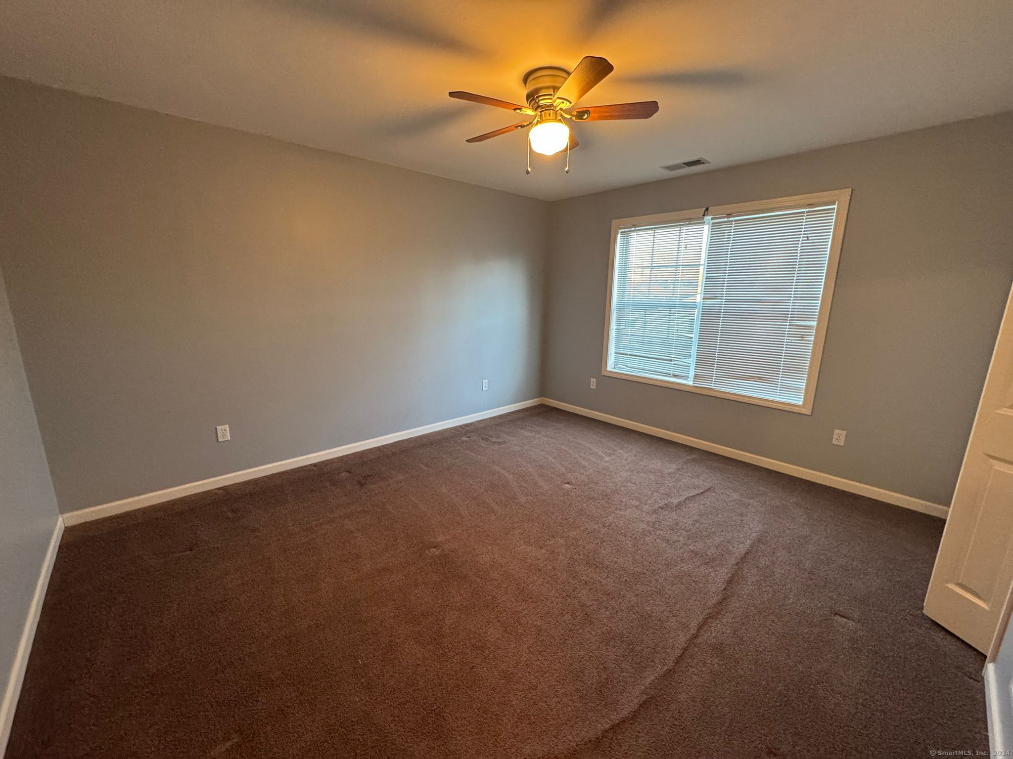59 Gilbert Lane Branford, CT 06405 - Photo 29 of 40 an empty room with a window