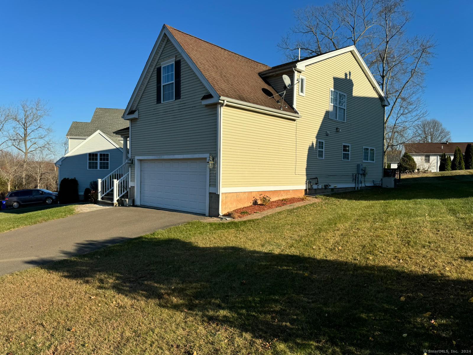 59 Gilbert Lane Branford, CT 06405 - Photo 3 of 40 a view of a house with a yard