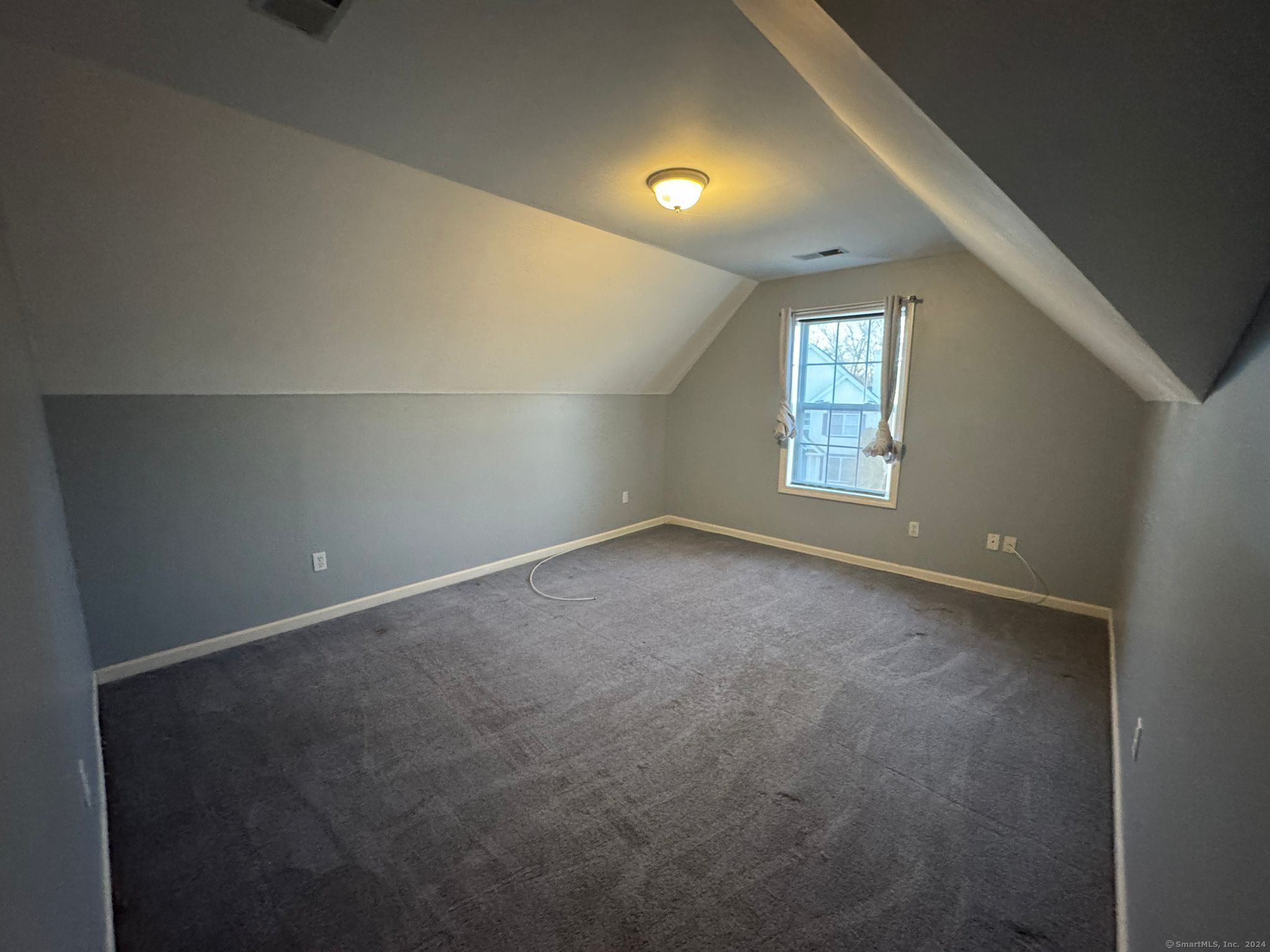 59 Gilbert Lane Branford, CT 06405 - Photo 31 of 40 an empty room with windows