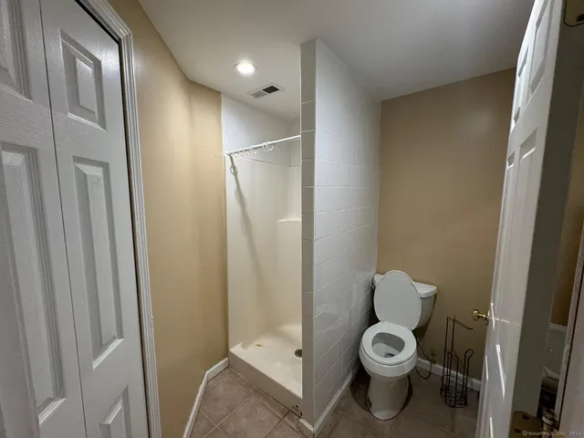 a view of a room with lots of car windows