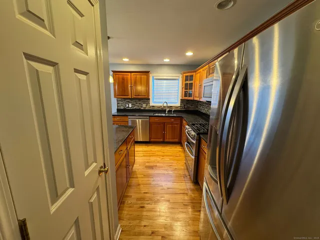 a view of a kitchen with a sink
