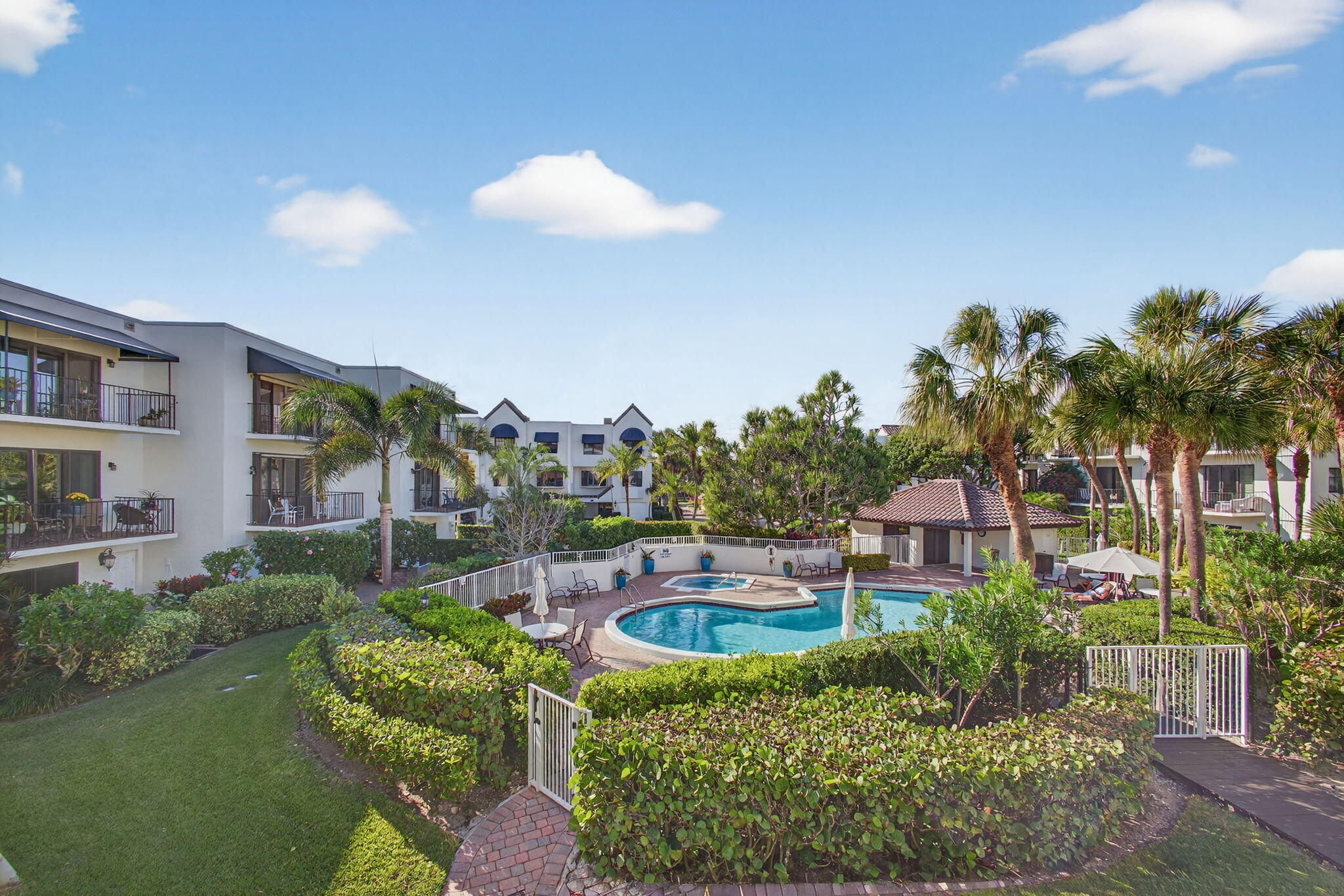 170 Celestial Way, Unit 35 Juno Beach, FL 33408 - Photo 29 of 53 a house view with a garden space