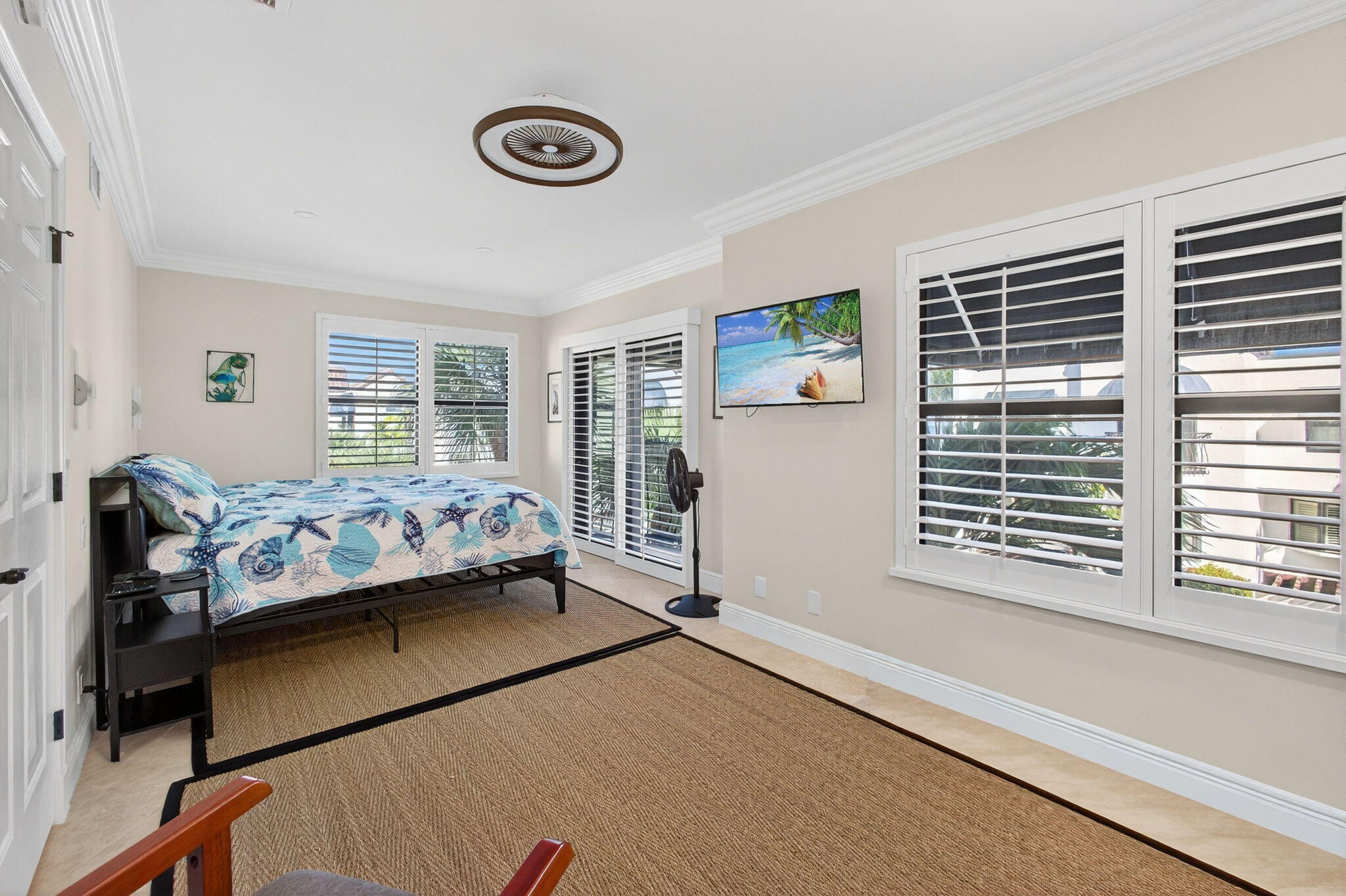 170 Celestial Way, Unit 35 Juno Beach, FL 33408 - Photo 39 of 53 a bedroom with bed and a window