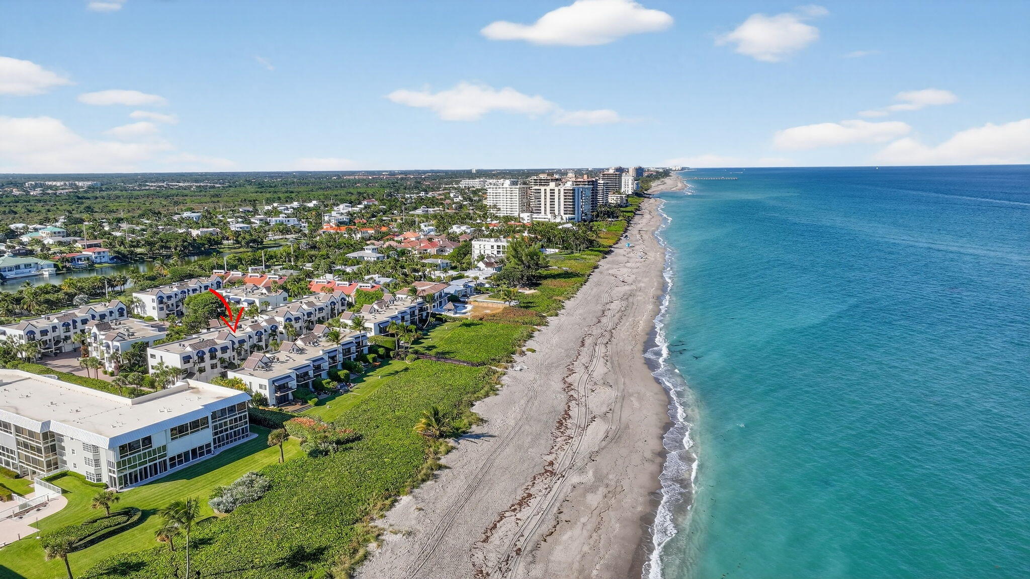 170 Celestial Way, Unit 35 Juno Beach, FL 33408 - Photo 50 of 53 an aerial view of a house with a yard