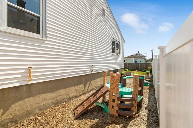 a view of a back yard of the house