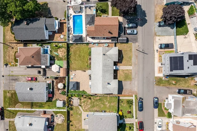 aerial view of residential houses with outdoor space