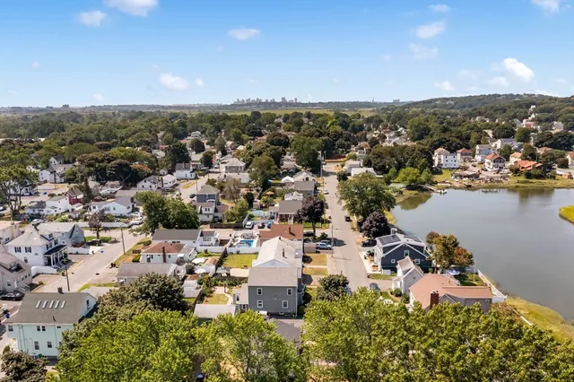 an aerial view of a city with lots of residential buildings