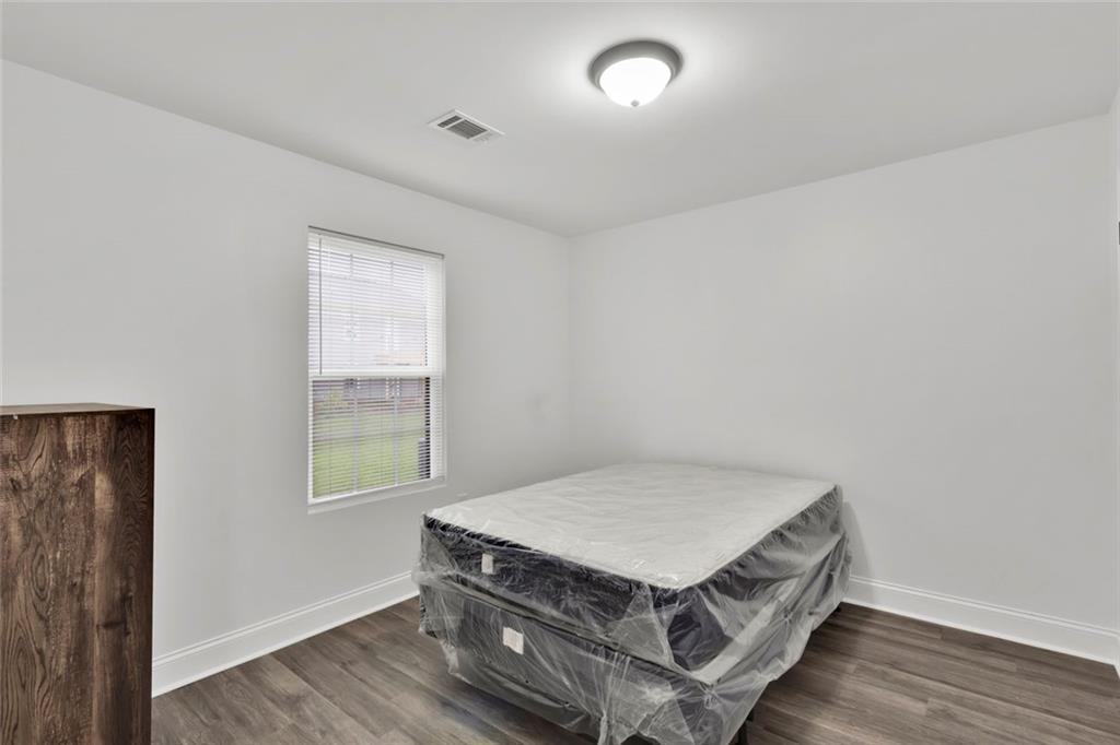 614 Elberta Street Fort Valley, GA 31030 - Photo 17 of 31 an empty room with windows