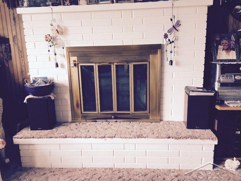 3420 East Moore Road Saginaw, MI 48601 - Photo 3 of 16 Living room with nice wood fireplace.