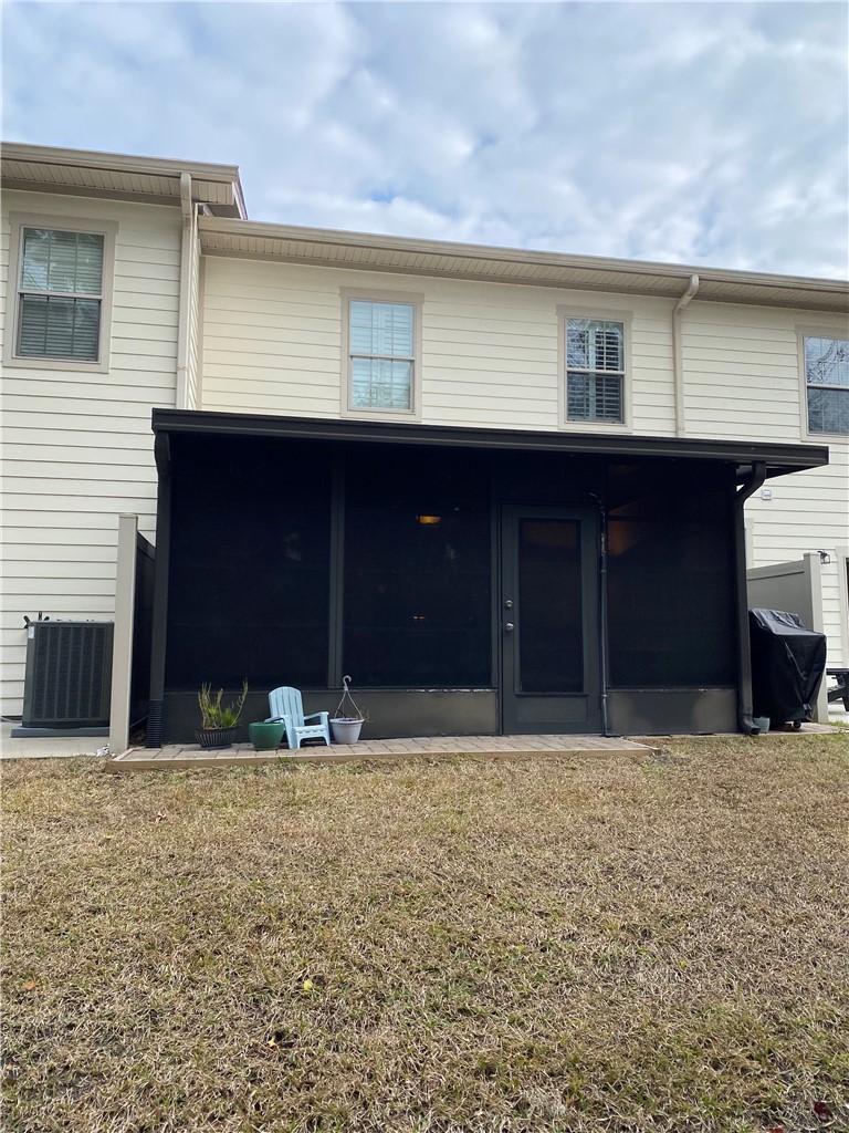 803 Reserve Lane St. Simons Island, GA 31522 - Photo 4 of 11 Exterior of screened/enclosed porch