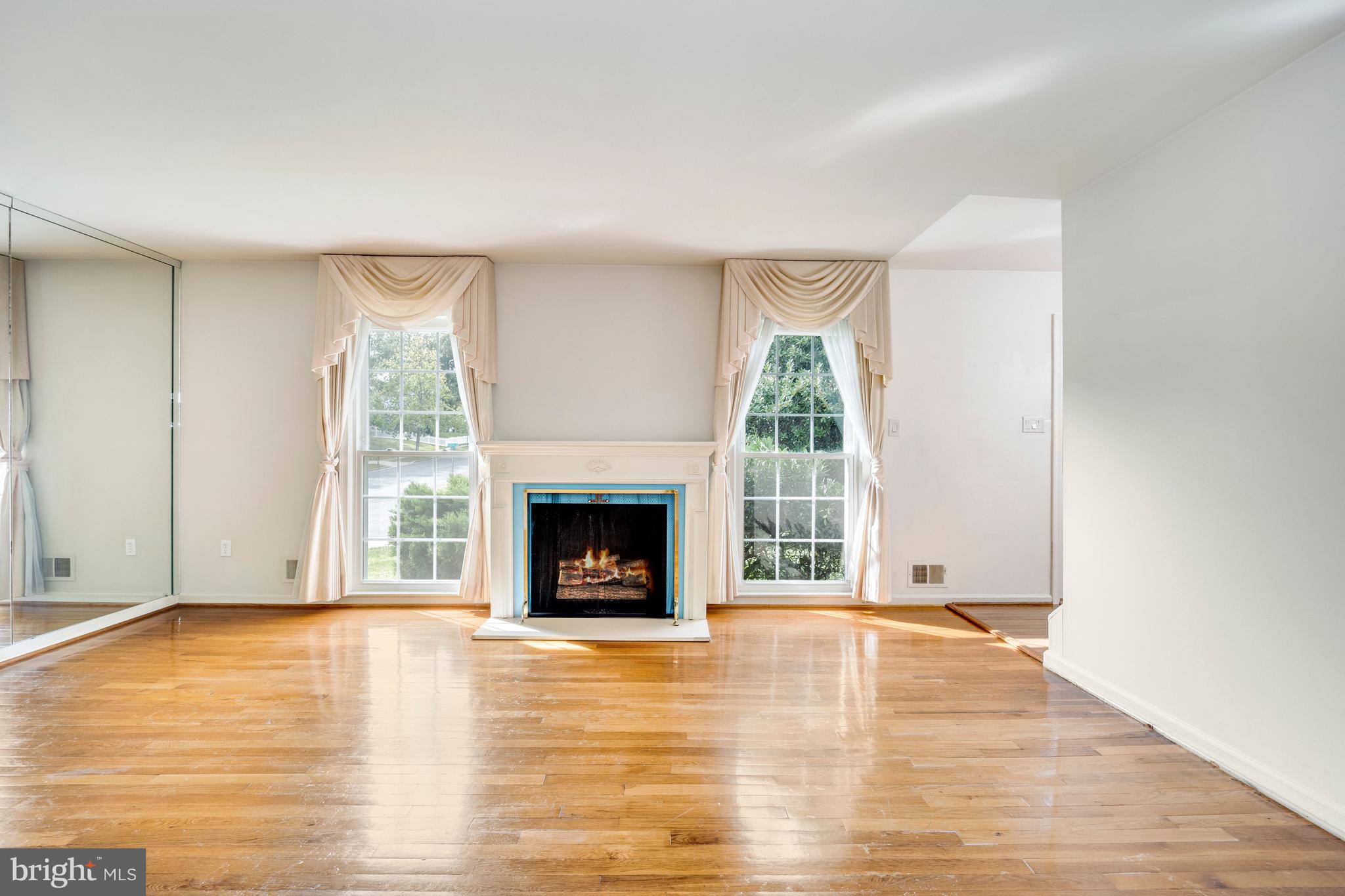 9110 Ivanhoe Road Fort Washington, MD 20744 - Photo 9 of 57 Living room with beautiful hardwoods