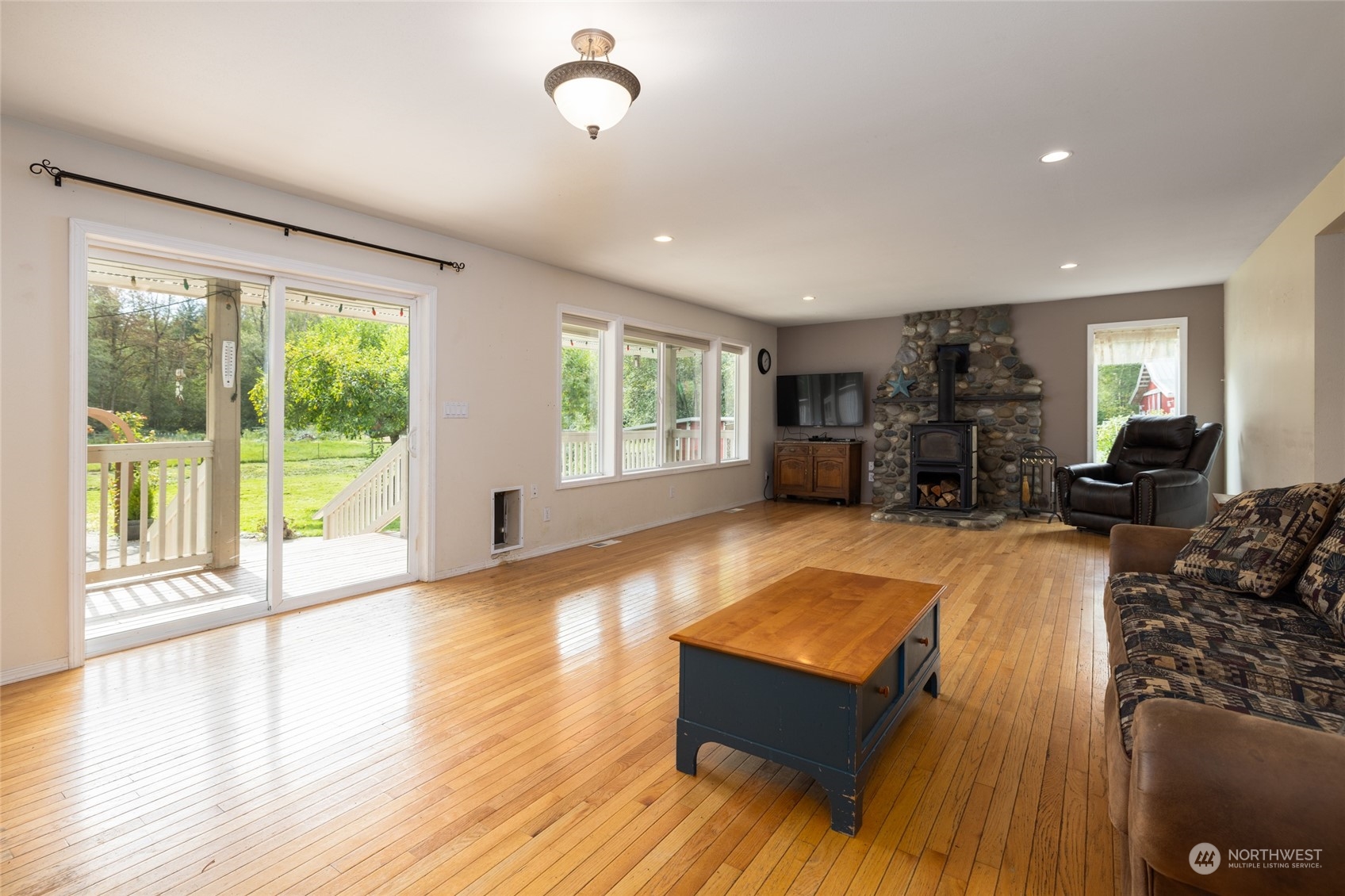 23610 Hoogdal Road Sedro-Woolley, WA 98284 - Photo 20 of 39 a living room with furniture and a large window