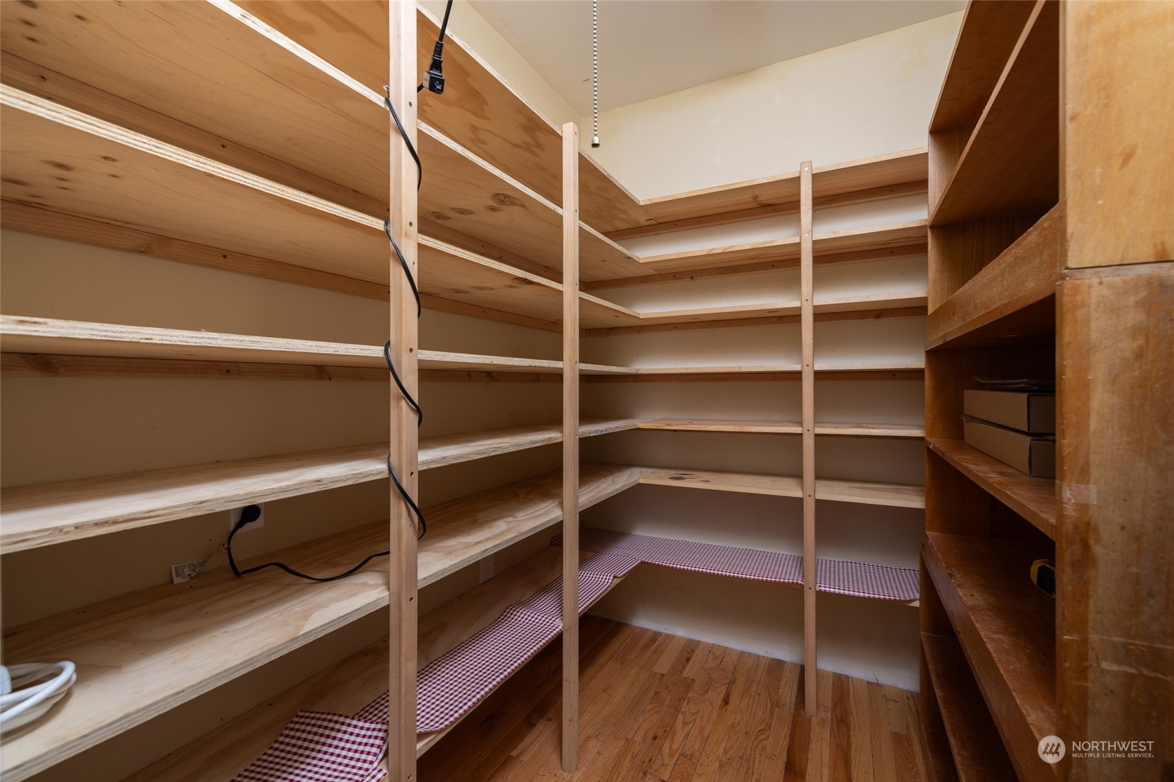 23610 Hoogdal Road Sedro-Woolley, WA 98284 - Photo 23 of 39 a view of walk in closet with empty racks