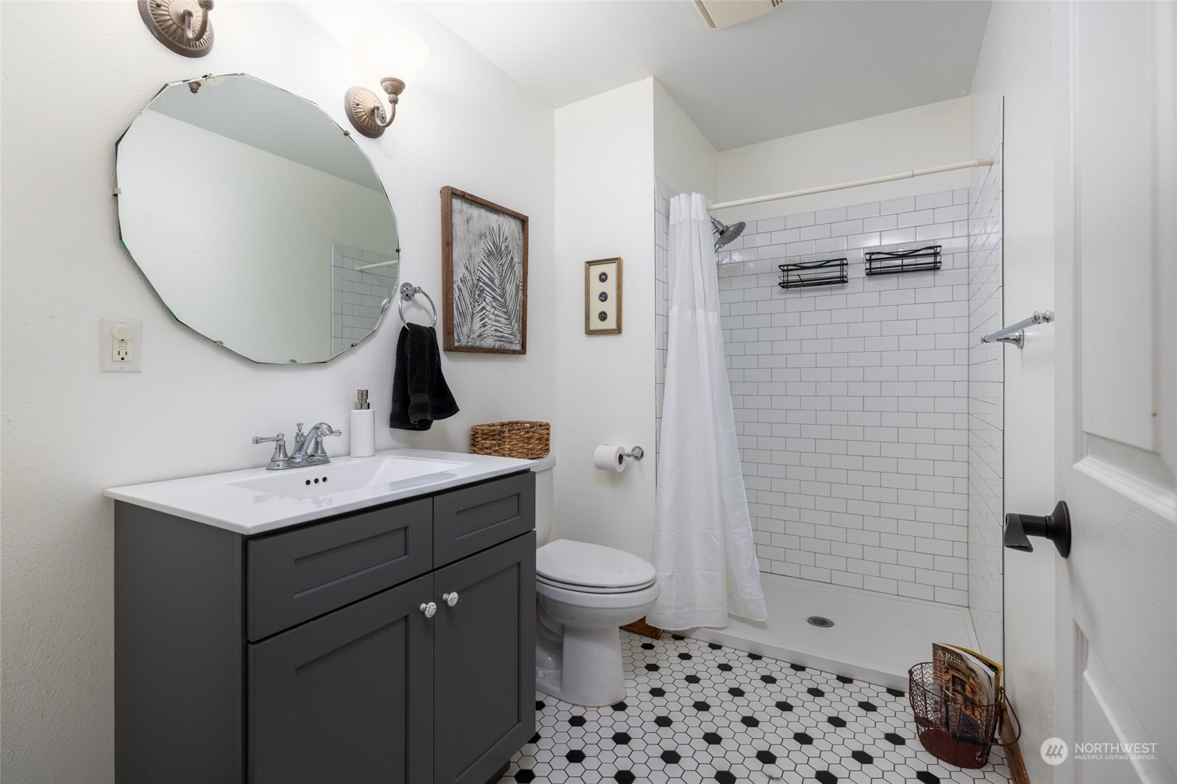 23610 Hoogdal Road Sedro-Woolley, WA 98284 - Photo 30 of 39 a bathroom with a sink a toilet and shower