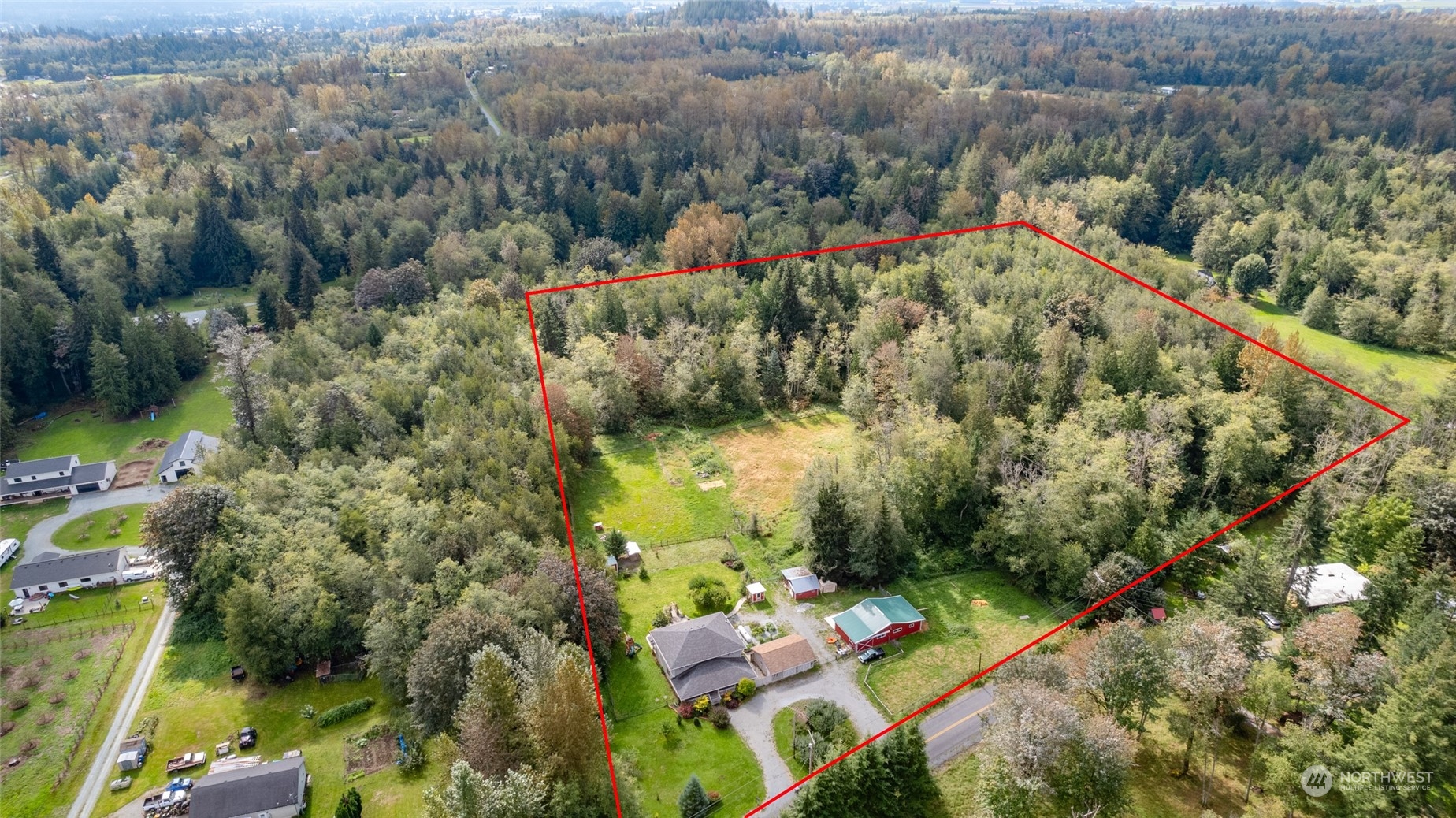 23610 Hoogdal Road Sedro-Woolley, WA 98284 - Photo 3 of 39 an aerial view of a house with a yard