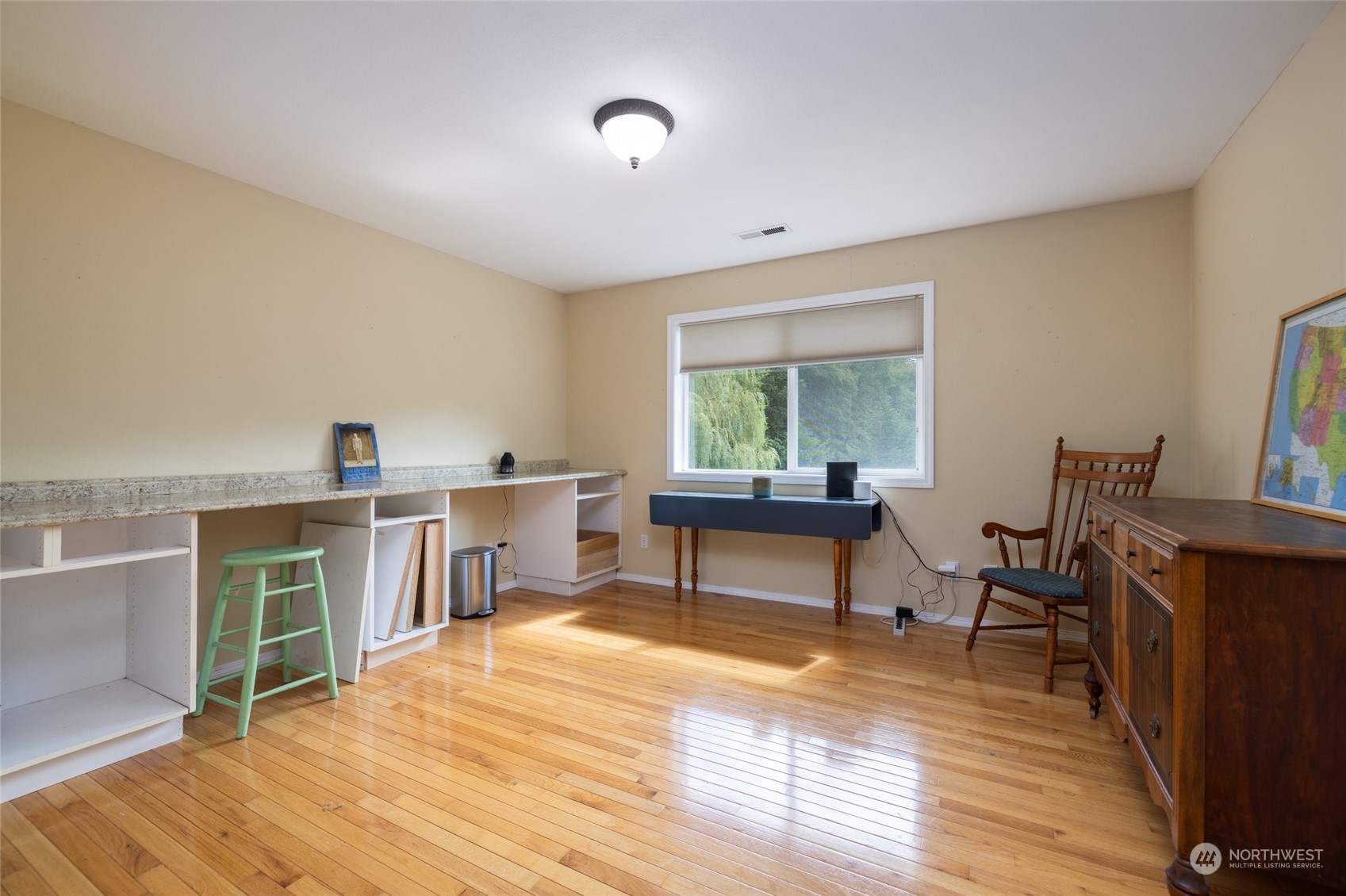 23610 Hoogdal Road Sedro-Woolley, WA 98284 - Photo 31 of 39 a work room with wooden floor and furniture