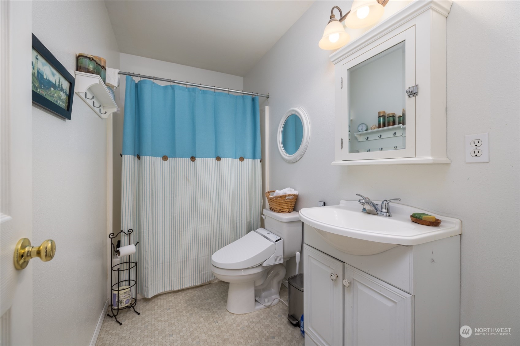 23610 Hoogdal Road Sedro-Woolley, WA 98284 - Photo 33 of 39 a bathroom with a toilet sink and mirror