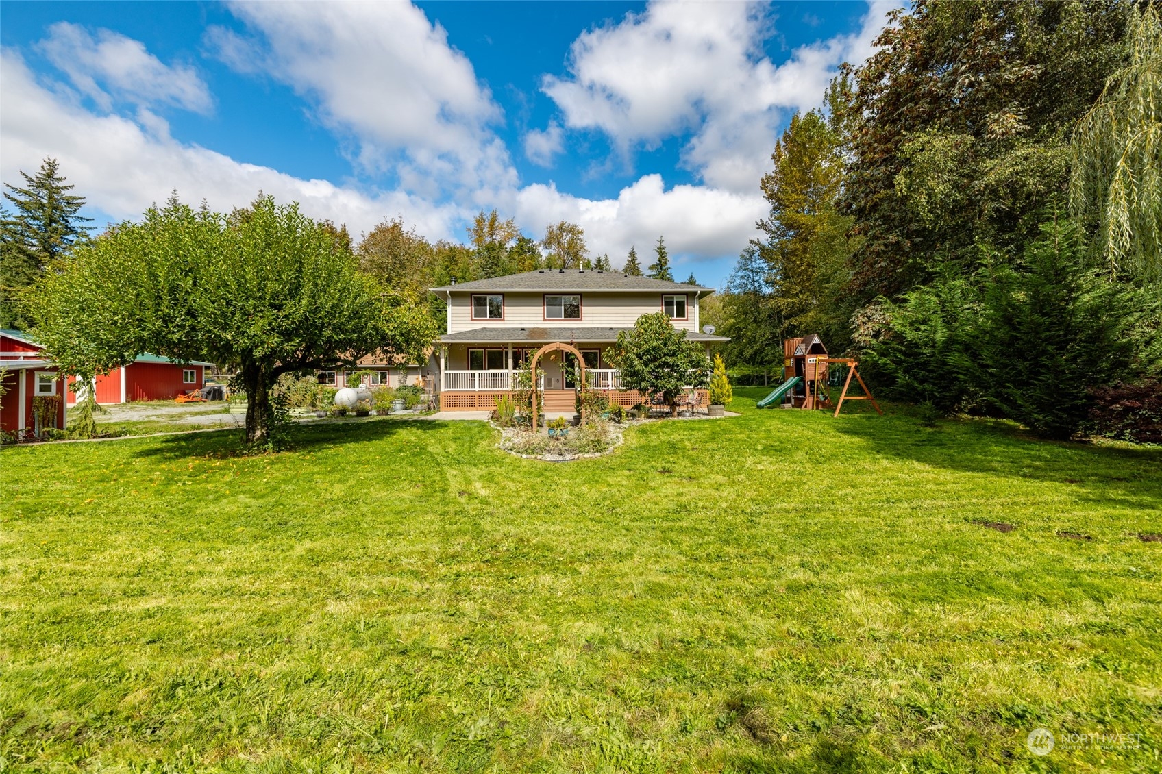 23610 Hoogdal Road Sedro-Woolley, WA 98284 - Photo 34 of 39 a view of a house with a back yard
